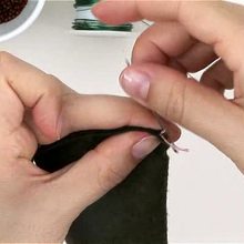 Video para fabricar una cartera de perlas