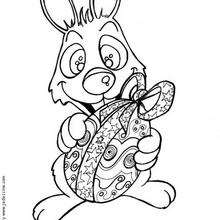 Dibujo para colorear conejo y huevo de chocolate - Dibujos para Colorear y Pintar - Dibujos para colorear FIESTAS - Dibujos para colorear PASCUA - Dibujos para colorear HUEVOS DE PASCUA